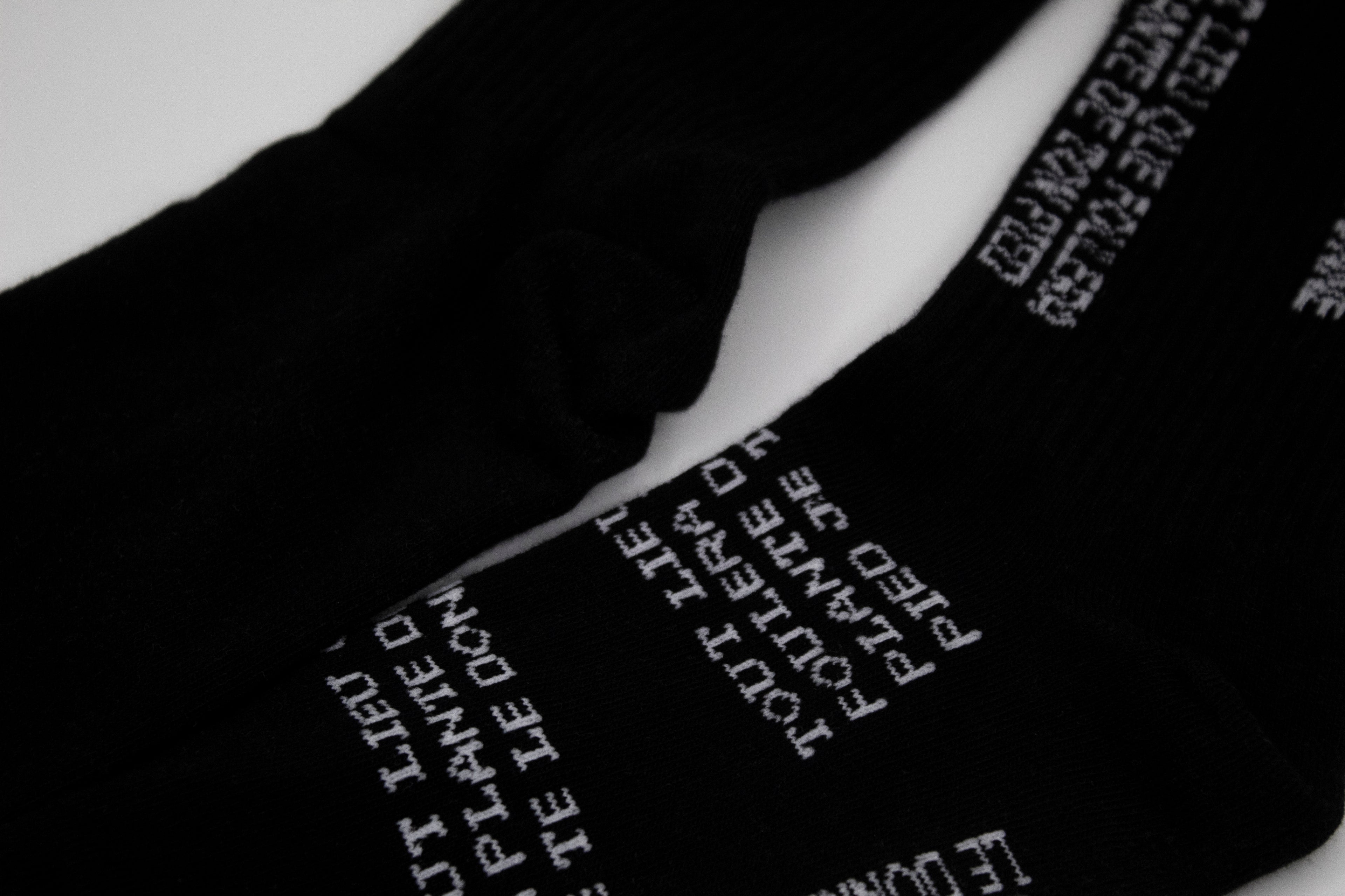 Chaussettes noires asymétriques