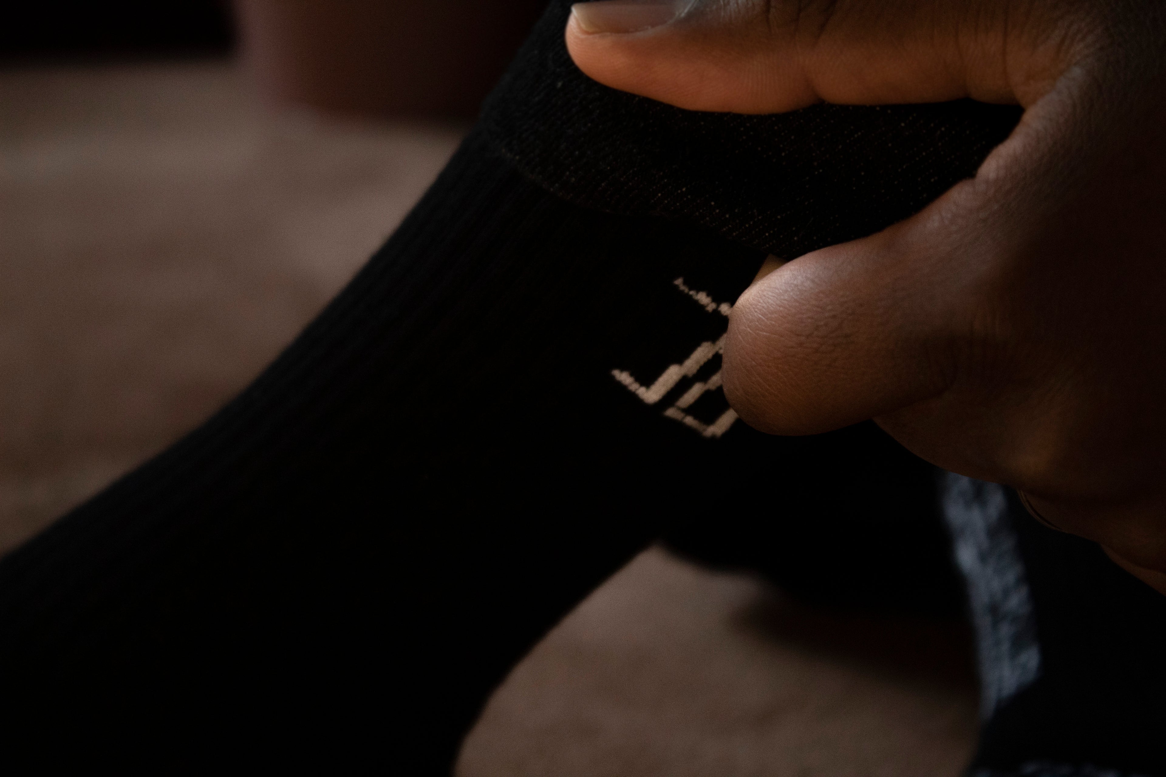 Chaussettes noires asymétriques